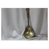 An Ornate Silverplated Serving Spoon