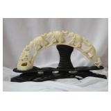 A Carved Bone Trail of Elephants on Stand
