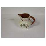 A Miniature Ceramic Pitcher