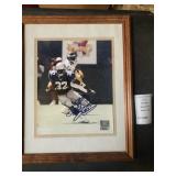 Autographed 8x10 photograph of former Seattle Seahawks running back Ricky Watters.