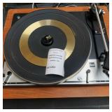 United Audio Dual 1215S Turntable In A Wood Grain Base