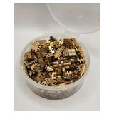 LOT OF GOLD WATCH PARTS.