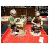 2 CERAMIC CLOCK REPAIRMEN STATUES