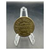 Patrick Raleigh Grocery One Dollar Brass Trade Tok