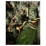 Plastic Tote with Artificial Christmas Garland