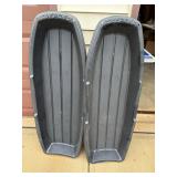 Pair of Torpedo Molded Plastic Snow Sleds