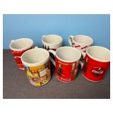 7 Coca-Cola Advertising Mugs