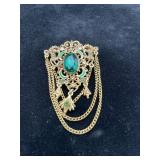 Florenza Green Rhinestone Filigree Brooch
