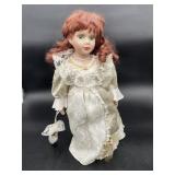 Porcelain Doll in Lace Dress
