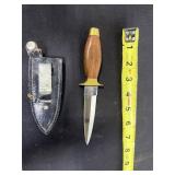Small dagger with leather sheath