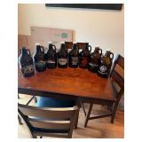 Assorted beer growlers