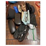 Assorted glasses with cases