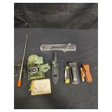 Assorted survival knives and tools