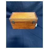Wooden box full of painting and art supplies