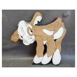 handcrafted, multi-layered wooden calf wall decor