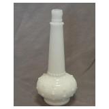 genie-shaped milk glass bottle