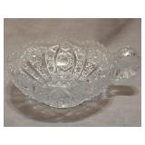 vintage clear pressed glass handled nappy