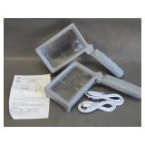 two rechargeable, foldable magnifying lights