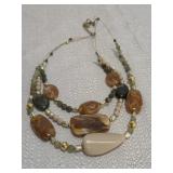 multi-strand earthy marbled bead statement