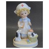 Napcoware Bone China Nurse & Puppies Figurine