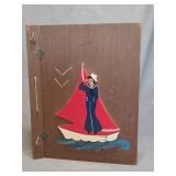 vintage handcrafted wooden-covered scrap book
