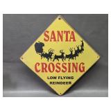 Santa Crossing: Low Flying Reindeer metal sign