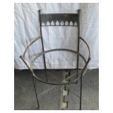 rustic wrought iron chair with circular seat frame