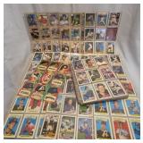 collection of baseball cards in protector sheets