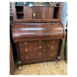 Antique roll top desk with claw foot legs