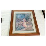 Framed Print of Woman in Garden