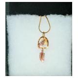 Gold Tone Wolf and Feather Pendant Necklace
