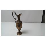 Decorative Metal Ewer with Embossed Floral Motifs