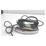 Vintage Steam Iron with Black Handle and Chrome Ba
