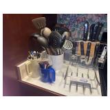 Assorted Kitchen Utensils, Knives, and Napkin Holder