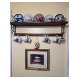Wall Shelf, Assorted Tea Cups & Saucers, and Framed Print