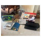 Massage Mat, Assorted Scrapbooking Materials, Bubble Blower, and Binders