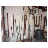 Contents of Wall - assorted long handled tools