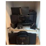 Contents of Cabinet - assorted speakers and electronics