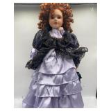 Jmisa 18-inch porcelain Victoria doll with red cur