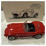CREATIVE MASTERS LTD 427 SC COBRA IN HAND...