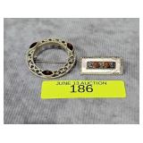 PAIR OF STERLING SILVER GEMSTONE BROOCHES