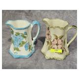 TWO- 6' CASH FAMILY POTTERY PITCHERS