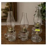 3- ANTIQUE GLASS THUMBHOLE OIL LAMPS