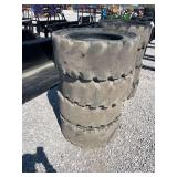 set 4 used solid tires wheels