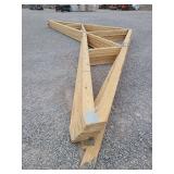 Trusses 32' long. 12' Overhang on one end. 8/12 roof pitch.