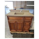 36' Vanity. Vanity top has a small crack.