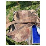 Blue barrel with horse supplies