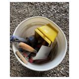 White bucket of misc