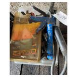 Tote of clamps and more