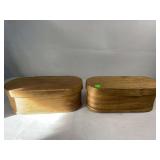 2 wooden oval boxes
